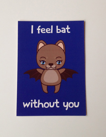 voorkant blauwe wenskaart met illustratie van een vleermuis met de tekst i feel bad without you